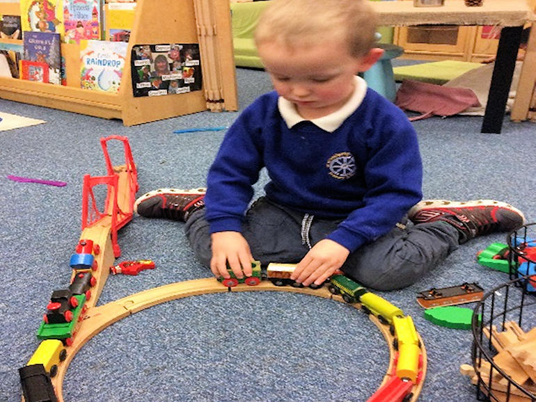 Playing trains in Nursery