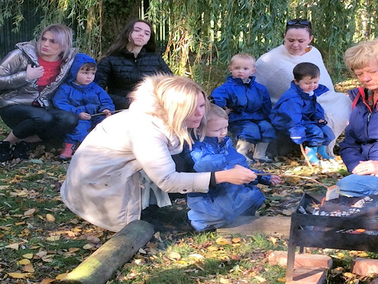 Toasting marshmallows at Forest School