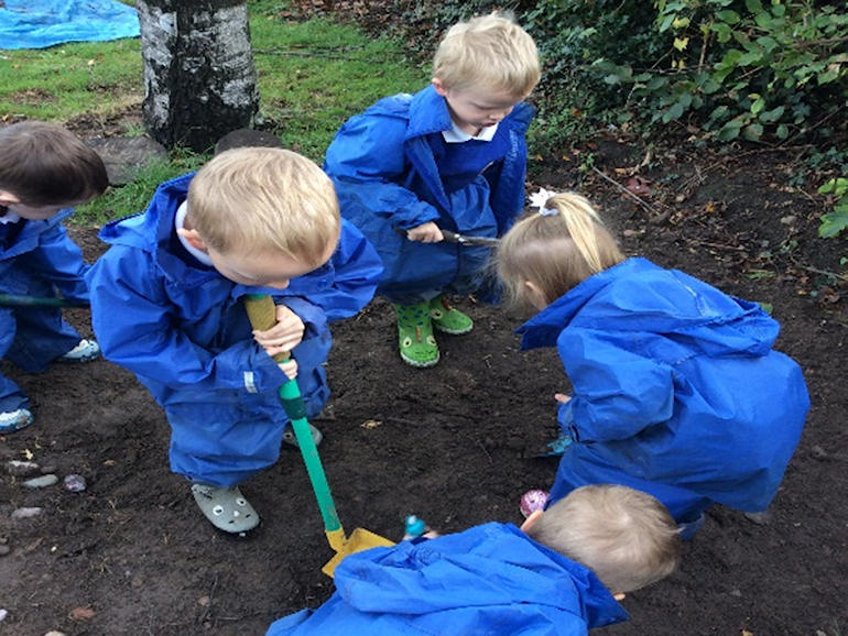 Children digging in the soil