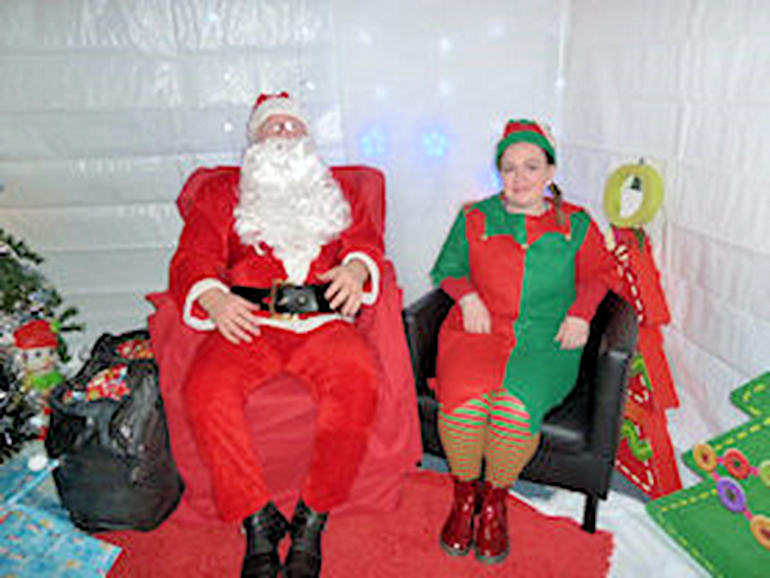 Father Christmas and an elf
